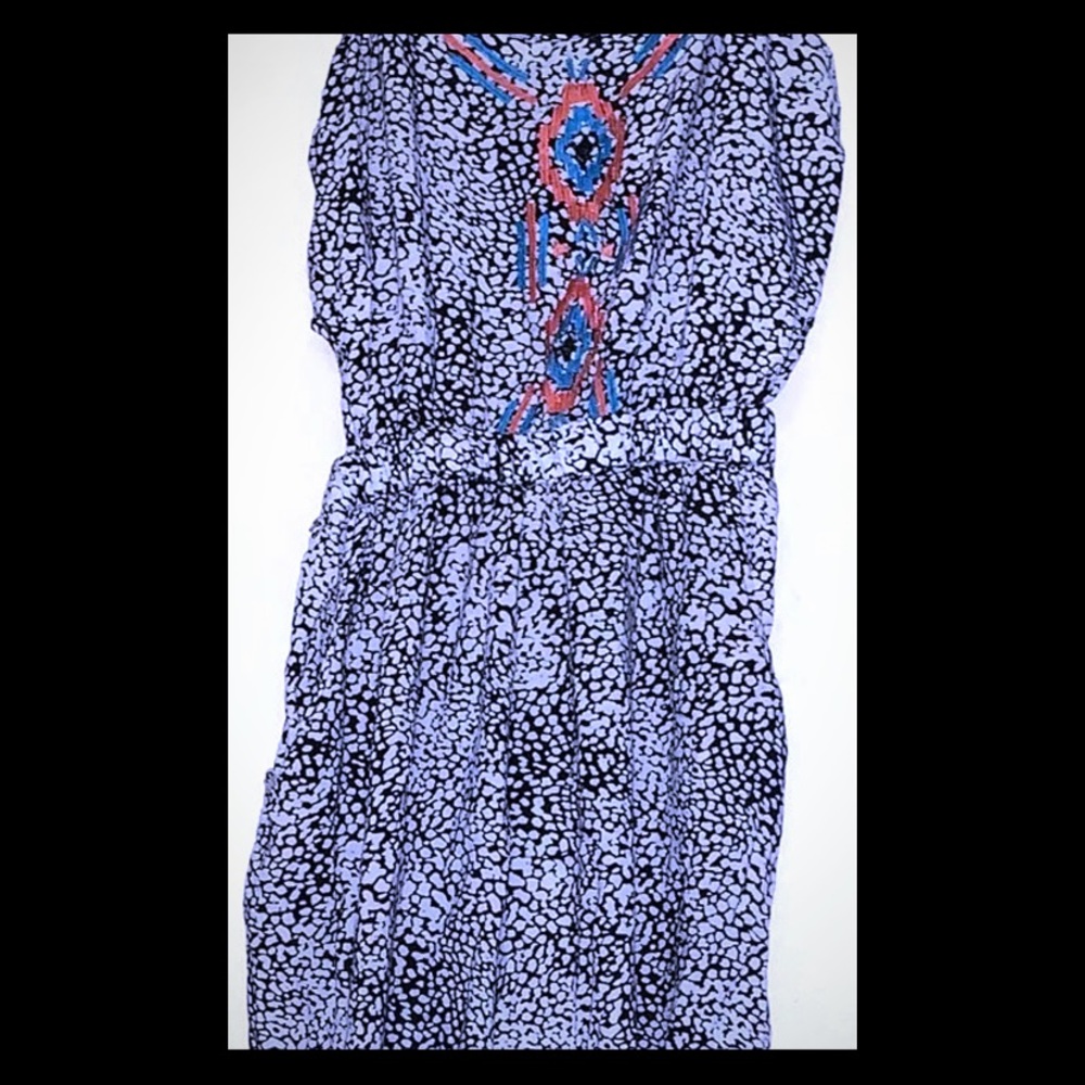 CUT OUT ROMPER WITH TRIBAL DETAIL